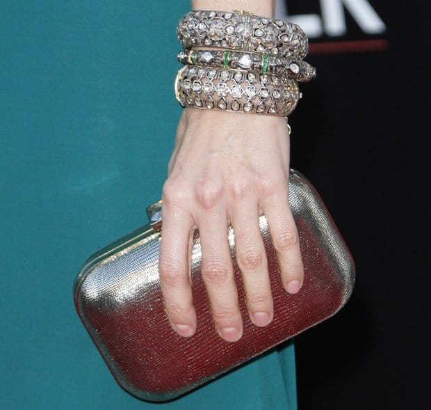 Accessorized perfection: Heather Graham showcases exquisite jewelry and a chic clutch at film premiere