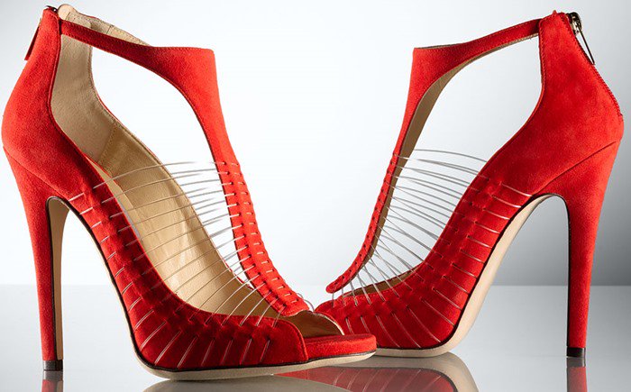 Jimmy Choo blends artistry and architecture, masterfully mixing textures with this red T-strap sandal