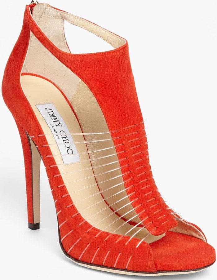 Jimmy Choo mixes textures with this red suede T-strap Taste sandal finished with invisible wire straps