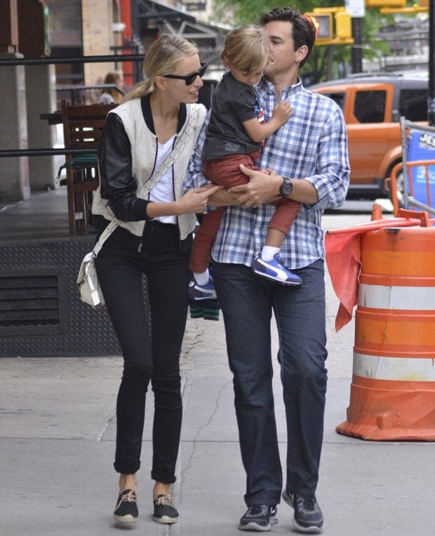 Karolina Kurkova, alongside Archie Drury and their son Tobin Jack, showcases a sporty-chic look in Tribeca, New York City on May 16, 2013