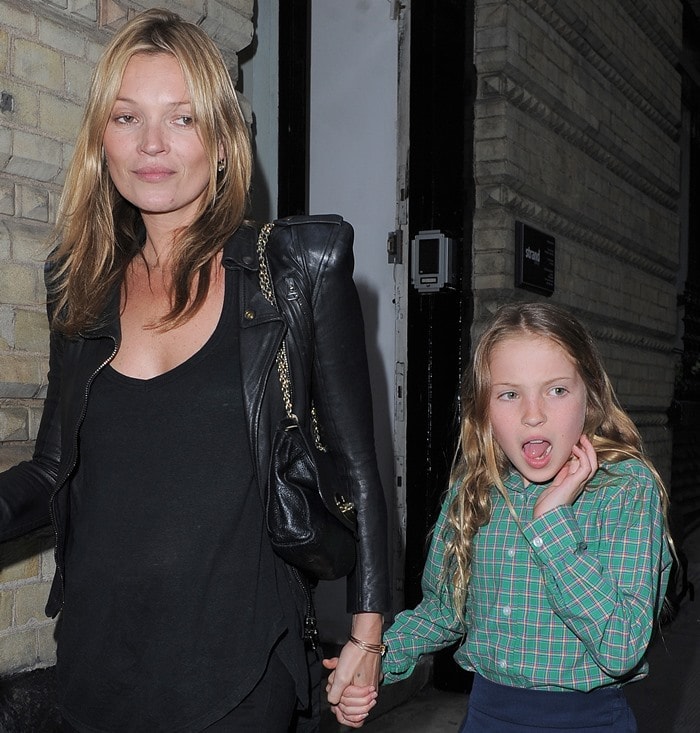 Kate Moss and her daughter Lila Grace Moss attend an exhibition of fashion photographer Debbi Clark's portraits