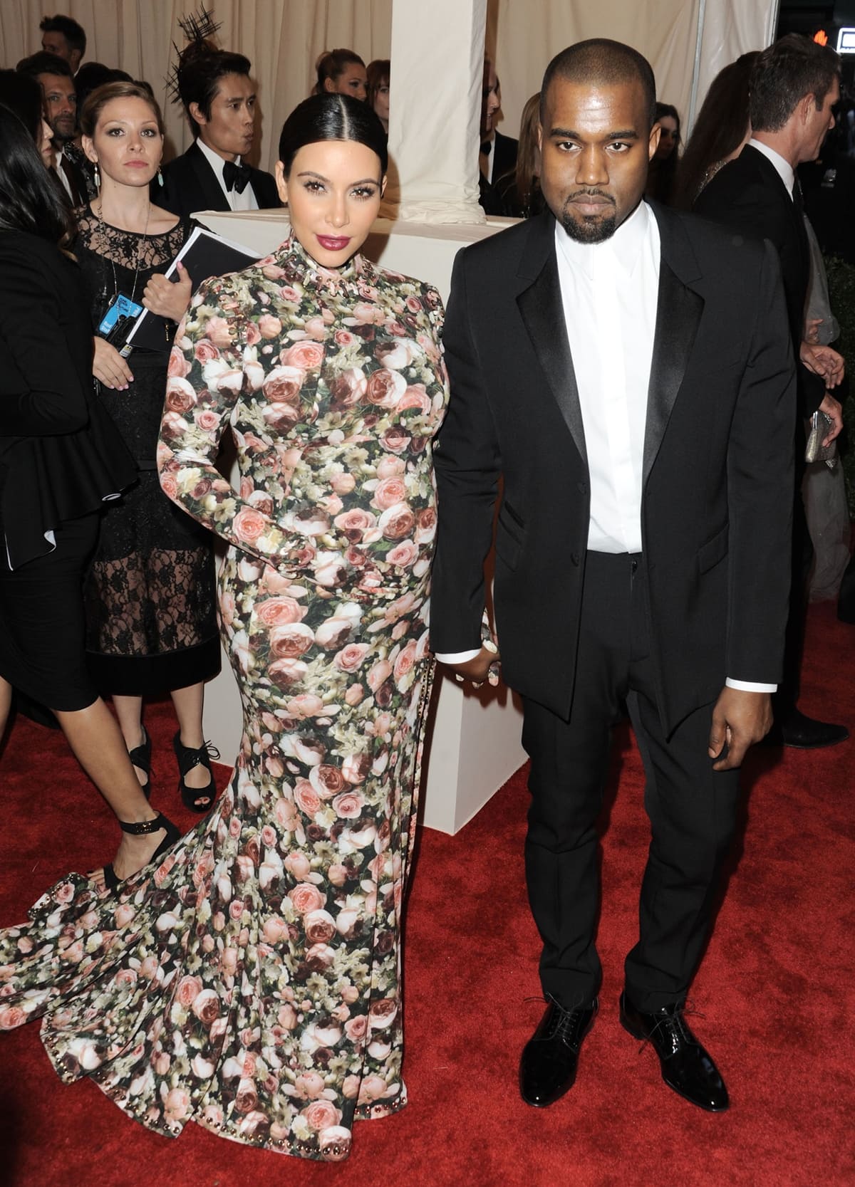 Joined by Kanye West at the 2013 Met Gala, Kim Kardashian wore a floral Givenchy dress that sparked memes comparing it to couch upholstery