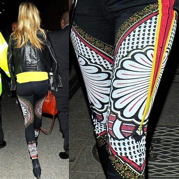 Laura Whitmore showcases Topshop MOTO Black Paisley-Print Leigh jeans at a music event