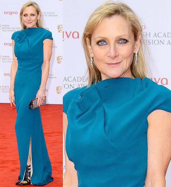 Lesley Sharp's elegant denim blue ensemble is marred by a rain-soaked hem at the 2013 Arqiva British Academy Television Awards