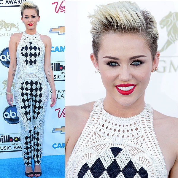 Miley Cyrus makes a bold statement in a chic Balmain jumpsuit paired with edgy Givenchy Shark-Lock sandals at the Billboard Music Awards