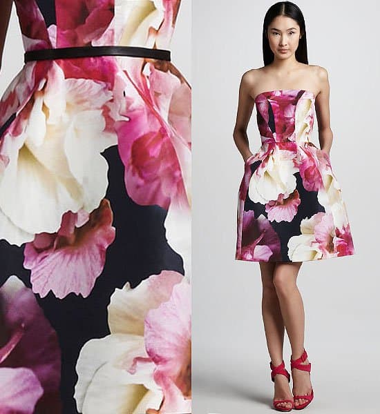 Monique Lhuillier redefines sophistication with this structured dress adorned with an oversized, refined couch floral print