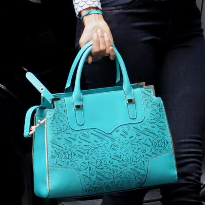 Fashion forward: Nina Dobrev showcasing the Rebecca Minkoff laser-cut 'Amorous' tote in Manhattan