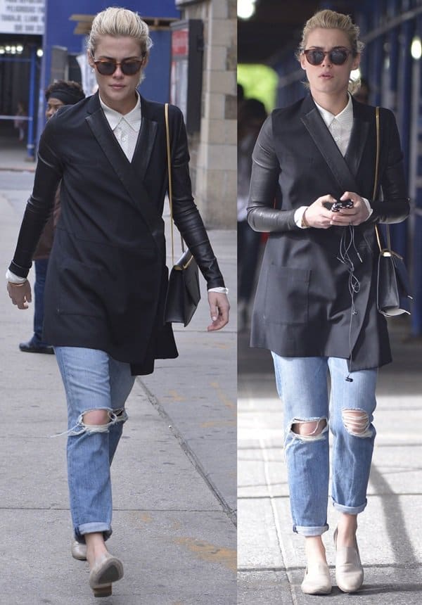 Captured in a stylish black blazer paired with distressed denim, Rachael Taylor exudes casual elegance in West Village, NYC