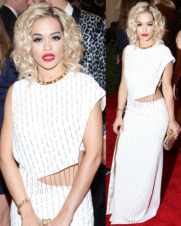 Rita Ora keeps it glamorous yet bold in a gold-detailed Thakoon dress at the Met Gala