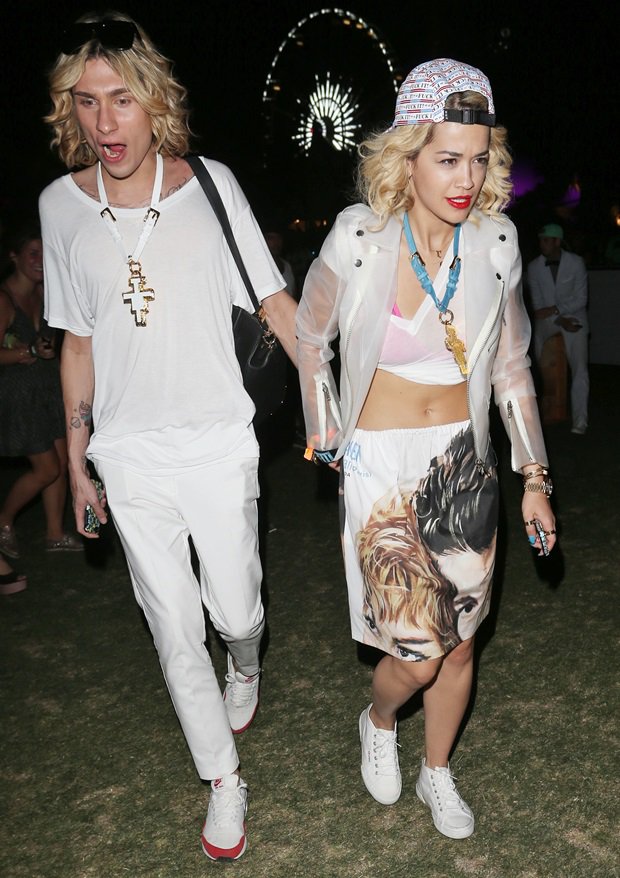Rita Ora spotted in a striking plastic jacket ensemble during the first weekend of Coachella 2013, Day 2