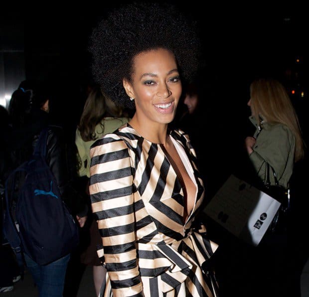 While her Jill Stuart Fall 2013 striped long-sleeve peplum dress was originally designed to be demure on the runway, Solange Knowles made a bold alteration by opening up the neckline to reveal a dramatic plunge, adding an unexpected twist to the ensemble