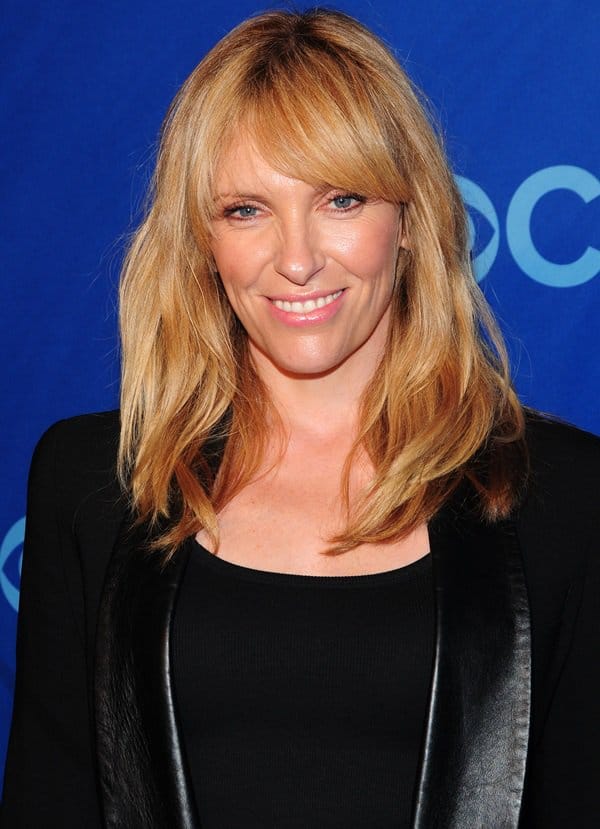 Elegantly suited, Toni Collette attends CBS Upfront 2013 at Lincoln Center, NYC, revealing a trend-setting tuxedo jacket paired with floral pants