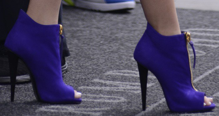 Zendaya's feet in purple Giuseppe Zanotti peep-toes