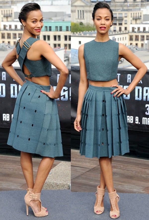 Zoe Saldana captivates in a chic Calvin Klein crop top and pleated skirt at the Star Trek: Into Darkness photocall in Berlin