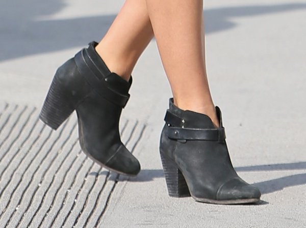 Close-up of Julianne Hough's stylish Rag & Bone 'Harrow' ankle boots, a perfect match for her denim dress