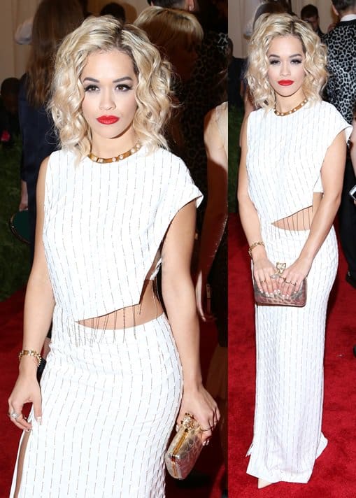 Rita Ora opted for an elegant and slightly understated approach at the Met Gala, wearing a simple white Thakoon gown that gracefully showed off a hint of skin