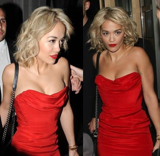 Rita Ora dazzles in a floor-length Vivienne Westwood red gown featuring a daring strapless neckline, captured while exiting Nobu, London