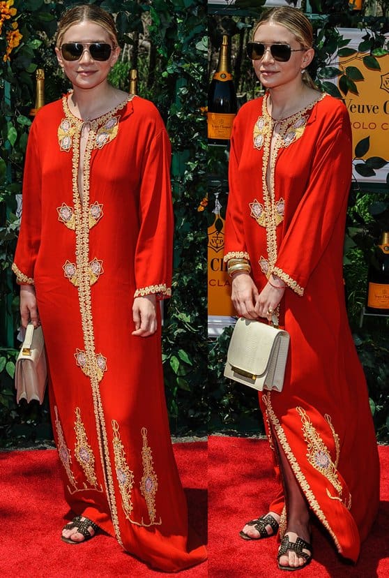 Ashley Olsen showcases her unique style in a vintage red kaftan at the Veuve Clicquot Polo Classic, Liberty State Park, NJ, June 1, 2013