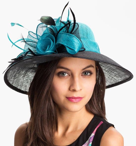 August Hat "Ruby" Derby Hat: A dramatic wide-brimmed choice with feathers and bows, $88