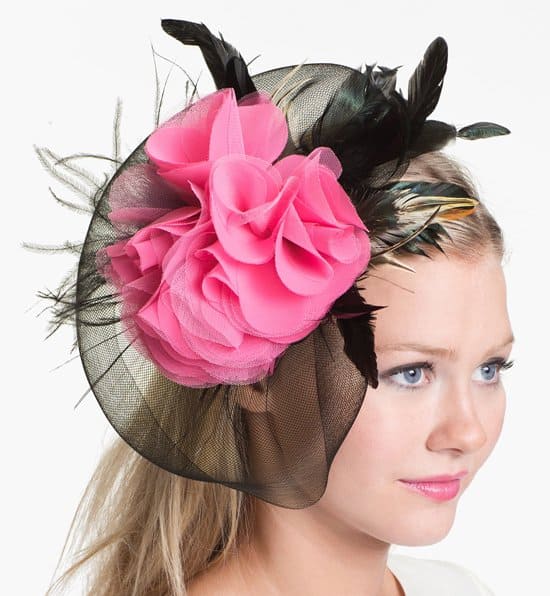 The Cara Fascinator: An elegant composition of a large fuchsia flower amid black plumes, $46