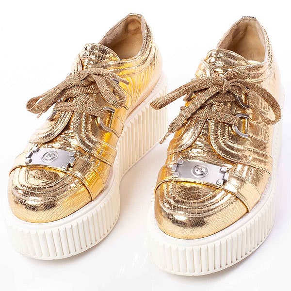 Rihanna Exudes Swag in Metallic Gold Chanel Creepers