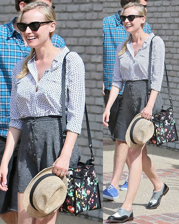 Diane Kruger attended Joel Silver’s Memorial Day Party on May 27, 2013, in a chic ensemble featuring an Equipment Slim Signature star pattern blouse, Robert Clergerie brogues, a 3.1 Phillip Lim Scout small drawstring bag, and Ralph Lauren 0rl8070 cat eye sunglasses