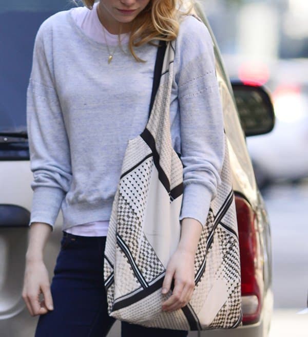 Emma Stone stylishly carries a geometric shopper bag from Twelfth St. by Cynthia Vincent