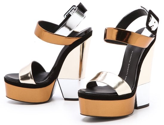 Flashing two-tone metallic leathers put a glamorous finish on these shimmering Giuseppe Zanotti sandals, which are designed with a substantial platform and cutout heel for dramatic height.