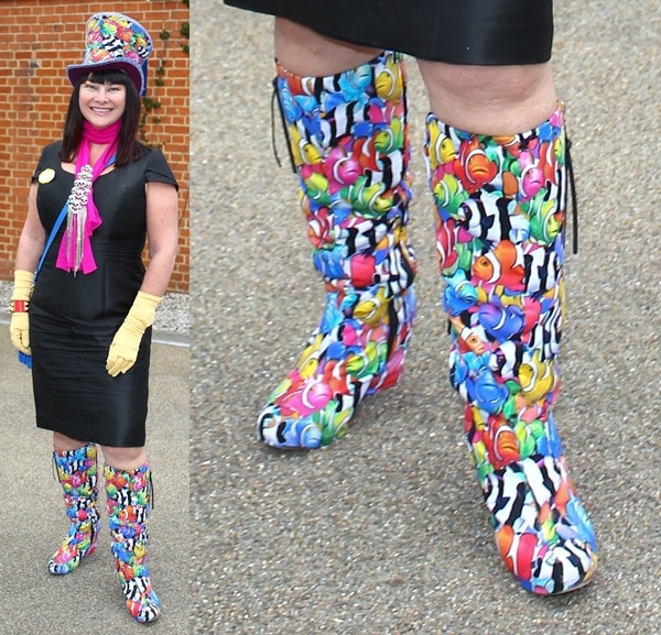 A guest on the first day of the Royal Ascot wearing a colorful pair of Wellies covered in clownfish