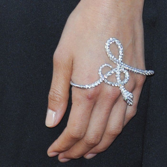 Close-up of Jamie Chung's Gaydamak snake hand bracelet, a statement piece designed to bring attention to the hands