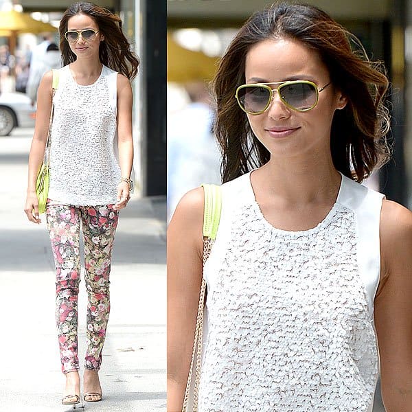Jamie Chung stylishly exits a business meeting in Beverly Hills, showcasing a breezy white top and floral jeans, June 13, 2013