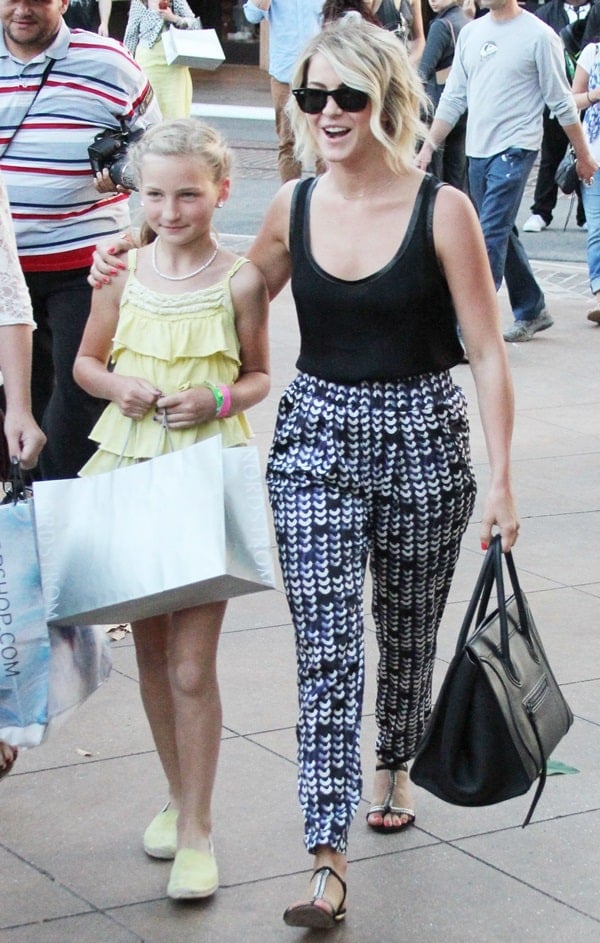 Julianne Hough in a black tank top paired with printed slouchy pants goes shopping with her niece Skye