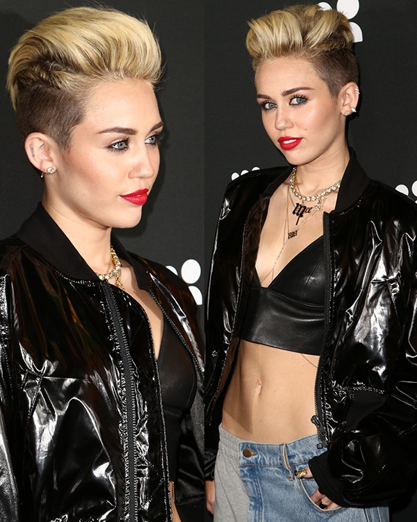 Miley Cyrus flaunts a KTZ 'Poet' embroidered short bomber jacket at the Myspace event in Los Angeles