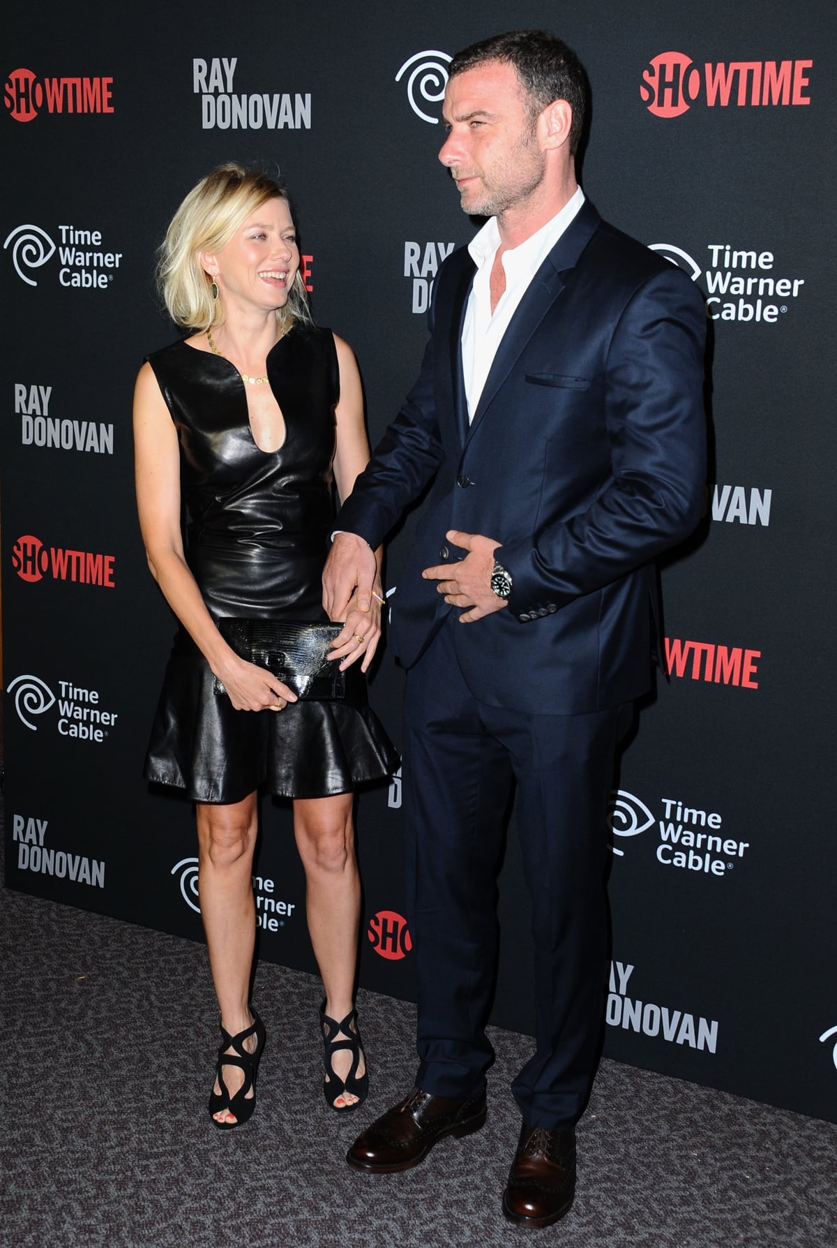 Naomi Watts and Liev Schreiber attended the premiere of 'Ray Donovan' in Los Angeles, with Schreiber in a midnight-blue suit and Watts in an Alexander McQueen leather dress