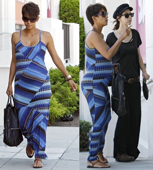 Halle Berry seen shopping for furniture with a friend in Culver City, showcasing her effortless maternity style in a striped dress