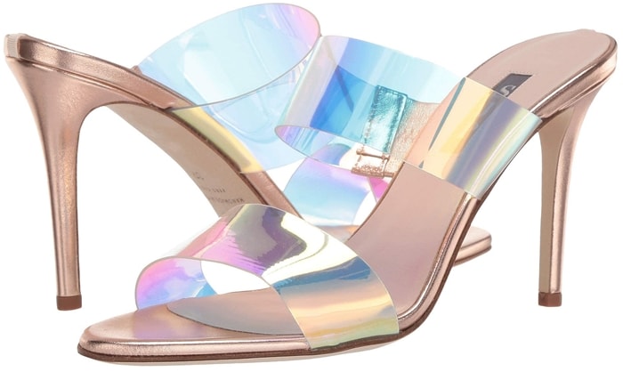 Set atop a slinky stiletto heel, these metallic mules from Sarah Jessica Parker have iridescent PVC and vinyl top straps