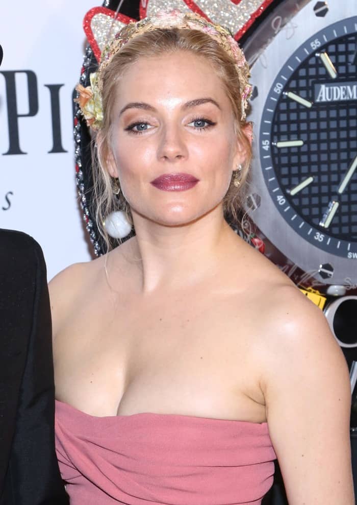 Close-up of Sienna Miller in a midi Burberry dress at the 67th Annual Tony Awards, New York City