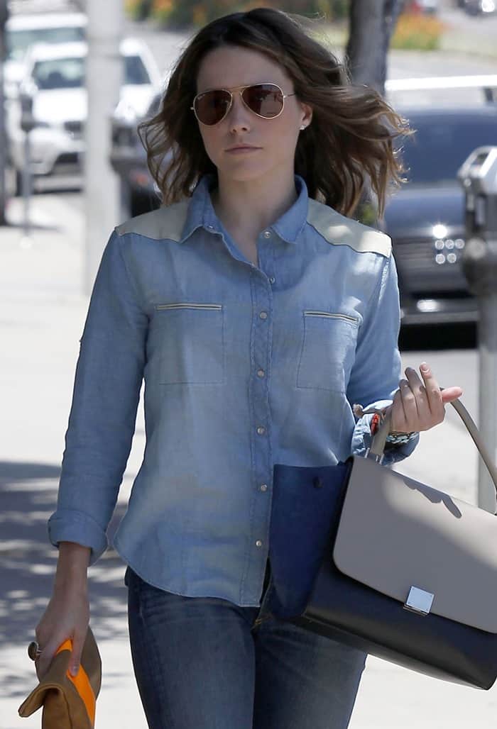 Sophia Bush steps out in West Hollywood showcasing a stylish ensemble with designer handbags, May 29, 2013