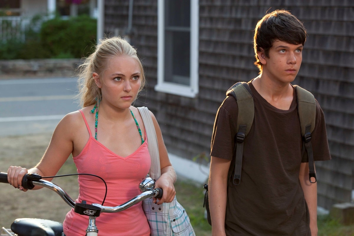 Liam James as the introverted 14-year-old Duncan from Albany, New York, and AnnaSophia Robb as Susanna Thompson in the 2013 American coming-of-age comedy-drama film The Way, Way Back