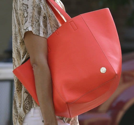 Heidi Klum spotted with a fiery coral Vince Camuto 'Coco' tote while out in Manhattan