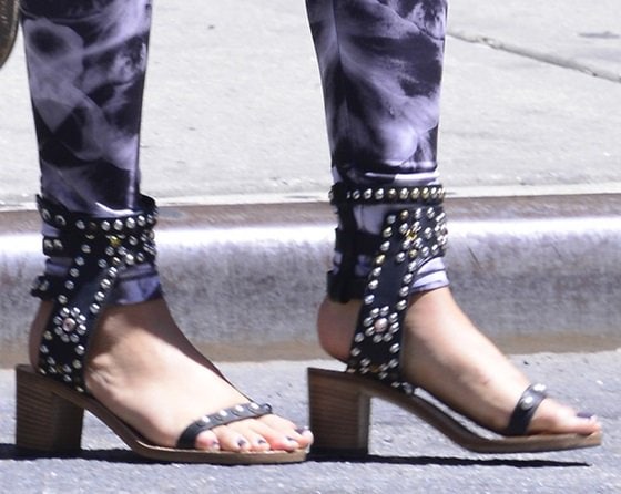 Food critic Katie Lee wearing Isabel Marant's 'Caroll Elvis' heeled cuff sandals