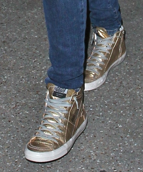 Mandy Moore rocks gold metallic Golden Goose sneakers