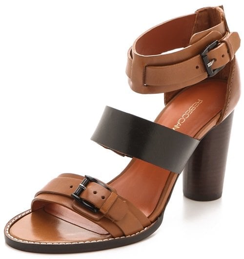 Layers of buckled straps lend an equestrian feel to these two-tone leather sandals from Rebecca Minkoff