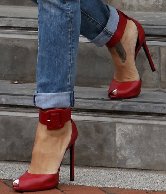 Rihanna showing off her feet in Saint Laurent Paris ankle-cuff sandals