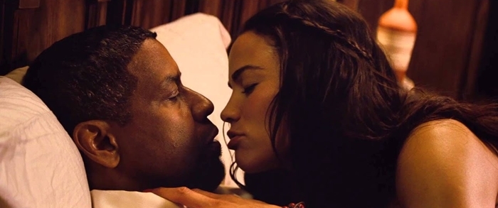 Paula Patton as DEA Agent Deb Rees in a topless scene with Denzel Washington in '2 Guns,' showcasing her commitment to realism in film