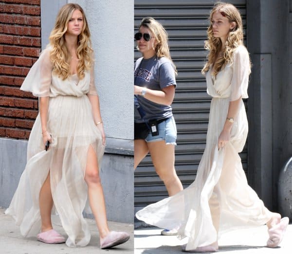 Brooklyn Decker dazzles in a flowy Saunder gown with a deep V neckline, ideal for a cinematic wedding scene