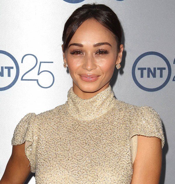 Cara Santana sparkles in a chic, high-neck glittery Lorena Sarbu dress at TNT's 25th Anniversary Party