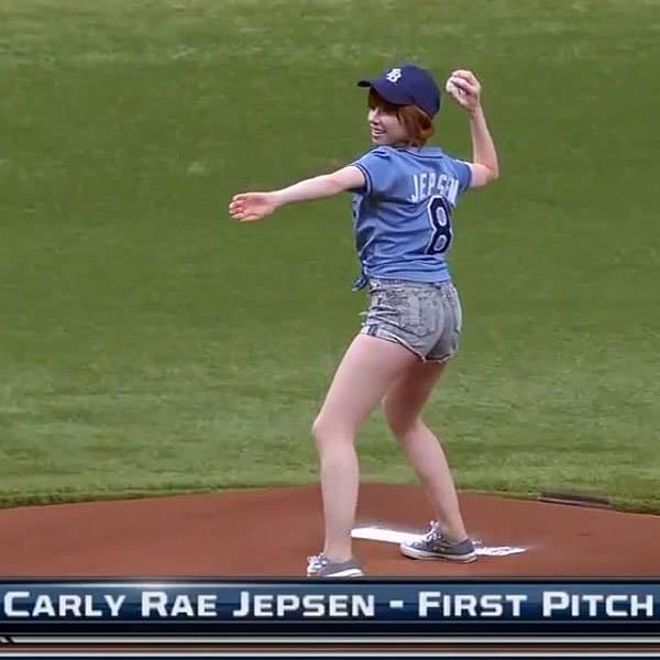 Carly Rae Jepsen radiates charm in casual shorts during her memorable first pitch at the Tampa Bay Rays game
