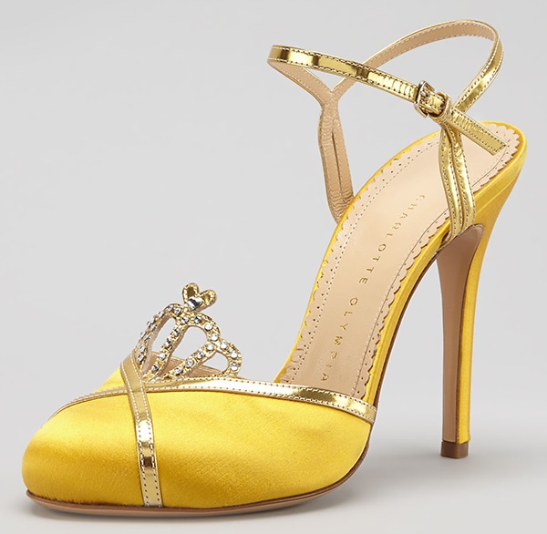 These lovely shoes are made of satin and feature mirrored metallic leather trimming, which makes this pair striking