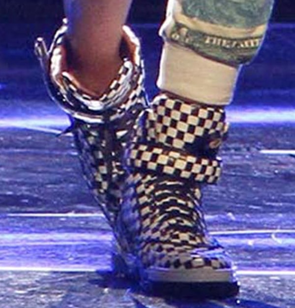 Ciara wears high-top Givenchy sneakers on stage